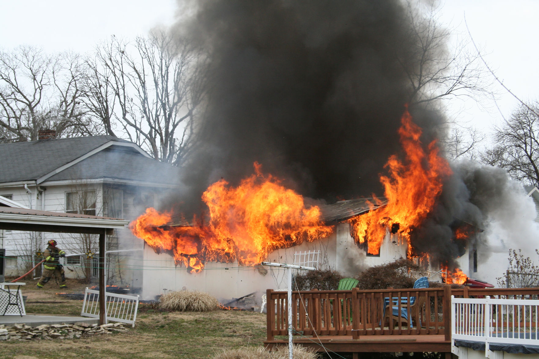 Firefighters Battle Garage Fire